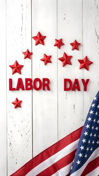 Red stars and american flag adorn white wooden background for labor day celebration