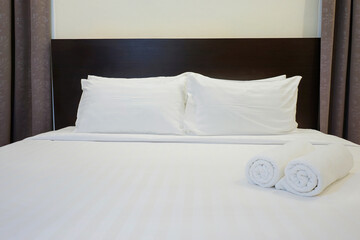 white bed with pillows