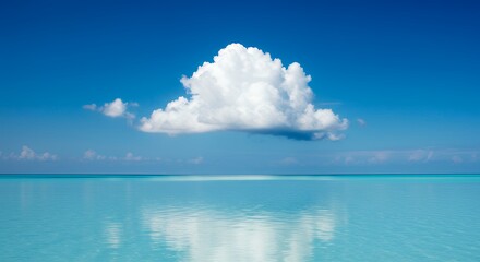 Fototapeta premium Serene Cloud Over Calm Ocean Water Under Bright Blue Sky