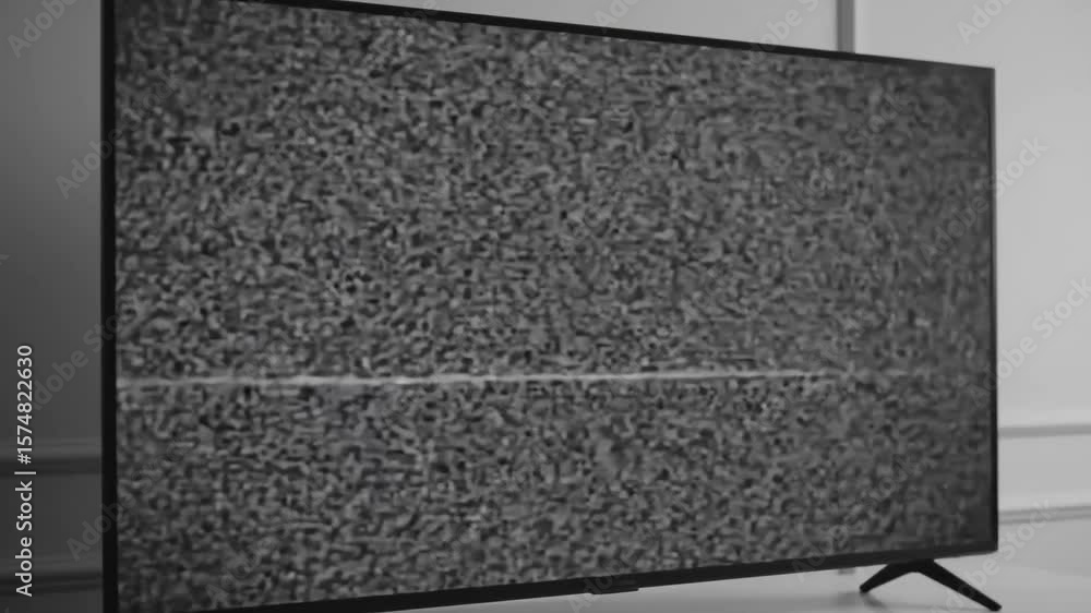 Poster variety of static noise patterns displayed on television screens, showcasing signal disruption