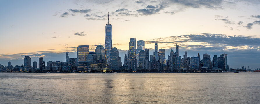 Panorama of the skyline of Lower Manhattan with the famous World Trade Center before sunrise