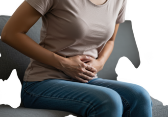 Woman holding her stomach in pain isolated on white background