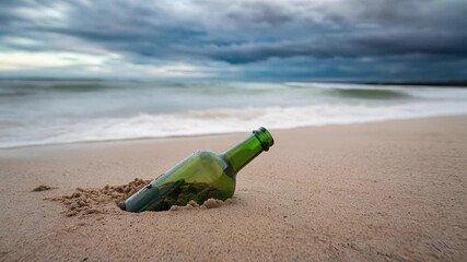 A message in a bottle washed up on a sandy beach with stormy sky. The bottle lies half-buried in the sand, waves gently approaching it