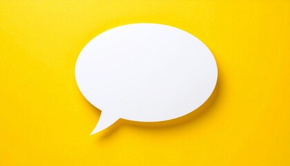 White speech bubble against vibrant yellow background providing a blank space for text