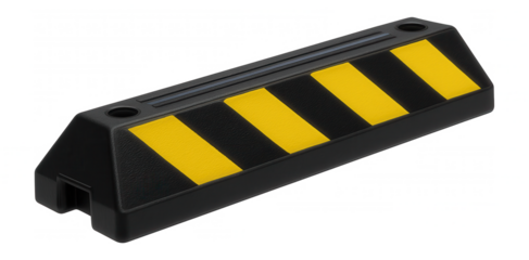 Rubber floor marking bumpers in black and yellow for vehicle stops in a parking garage.