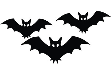 Three black bat silhouettes with spooky eyes flying on a white background
