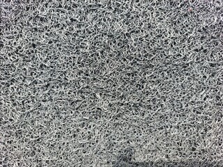 Metallic gray rock texture with mesh pattern, ideal for industrial design, 3D use, and tech-inspired art