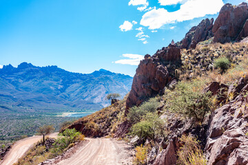 Scenic dirt road winding through rugged mountains in Valle de Luracatao, Salta, Argentina. A...