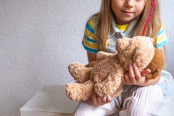 Child, happy sweet girl finds comfort in toy, early years, toy friend, emotional attachment,...