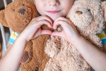 Child, happy sweet girl finds comfort in toy, early years, toy friend, emotional attachment,...