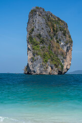 Naklejka premium Ko Poda island in Thailand, Krabi Province, Ao Nang. Part of Mu Ko Poda or Poda Group Islands and Hat Nopharat Thara-Mu Ko Phi Phi National Park. Vertical image