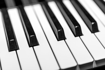 Close up of piano keys in black and white, abstract musical background for classical, jazz, and...