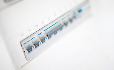 Close-up view of switches on fuse board.