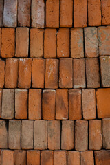 Red brick arranged in rows, building material, material texture, texture backgrounds