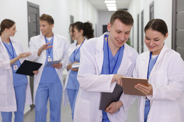 Group of medical students in uniforms indoors