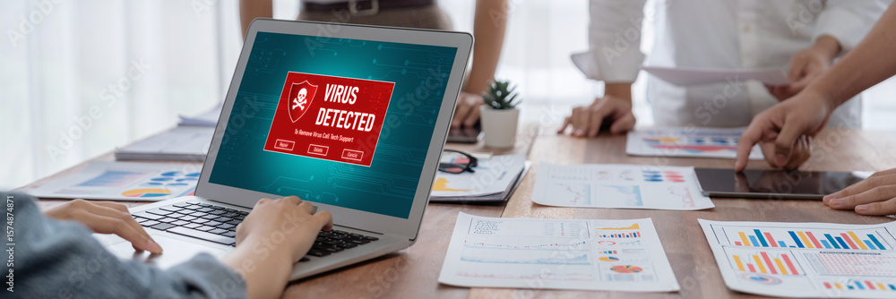 Poster virus warning alert on computer screen detected brisk cyber threat , hacker, computer virus and malw