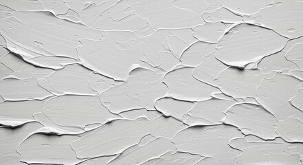 Close up of thick white paint strokes creating a textured abstract background surface art design