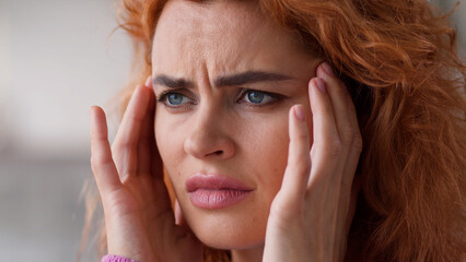 Close up portrait at home sad woman girl lady female wife indoors apartment bad feeling unhealthy...