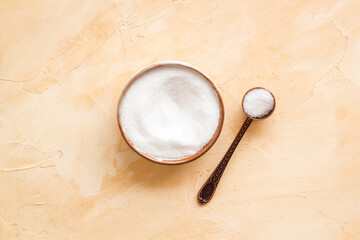 Finely grinding of edible sea salt, close-up. Maintaining acid-base balance concept
