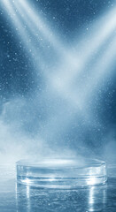 A clear ice podium bathed in dramatic blue spotlights and shimmering particles