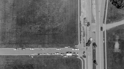 Stationary aerial drone view above an intersection with construction 