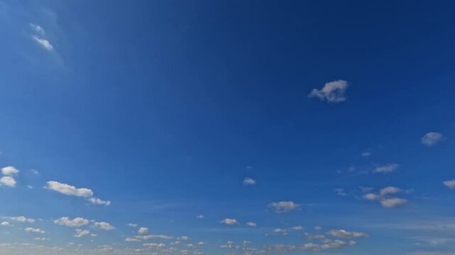 cute sky timelapse of fluffy clouds - natural background