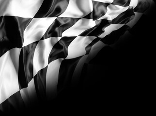 Checkered race flag on black