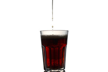 Slow Motion of Cola Pouring into a Glass on a White Background with White Surface

