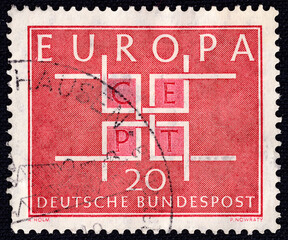 Letters CEPT in a square frames on a 1963 Germany vintage postage stamp.