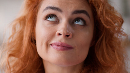 Close up Caucasian woman face pensive dreaming thinking thoughtful girl portrait lady pondering...