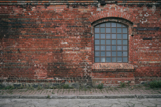 Old, empty, industrial warehouse wall, background with copy space
