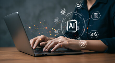 Person working on laptop with artificial intelligence concept and connected technology icons displayed