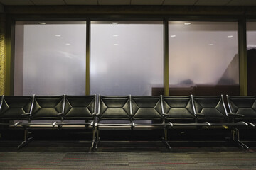 Seats in a waiting area at an airport. 
