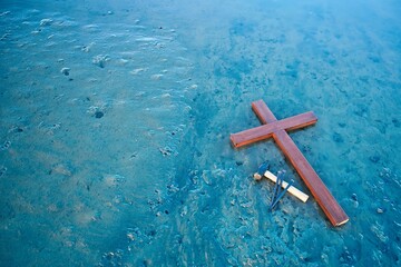 Laid Down Cross With Hammer And Nails On Blue