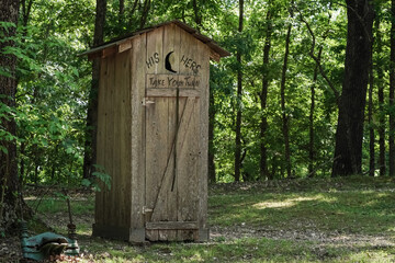 An old fashioned outhouse in the Ozarks.