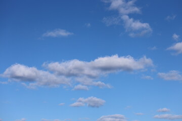 White clouds in a blue bright sky
