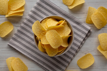 Potato Chips in a Bowl, top view. Flat lay, overhead, from above.