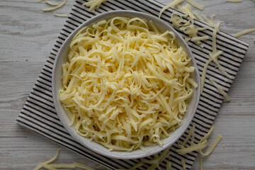 Organic Shredded Mozzarella Cheese in a Bowl, top view.