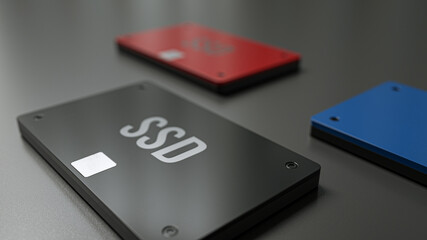 Close-Up View of Three Solid State Drives Aligned on a Dark Surface – Focused Foreground SSD Showcasing High-Speed Digital Storage Technology