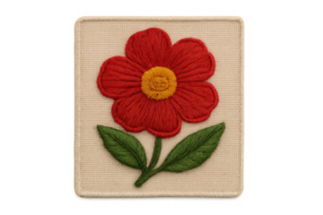 Close-up of a red flower with green leaves, embroidered on a square piece of beige canvas, isolated on a transparent background