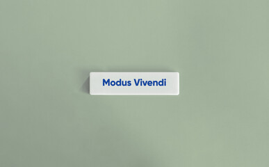 Modus Vivendi Latin Phrase on Minimal Sage Green Background with Letter Tile Design