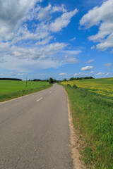 Highway wide road, transport and blue sky with clouds on a summer day