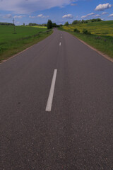 Highway wide road, transport and blue sky with clouds on a summer day