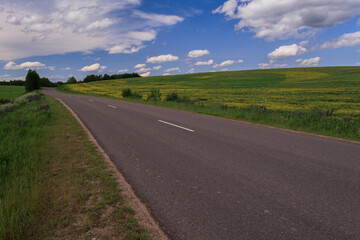 Highway wide road, transport and blue sky with clouds on a summer day