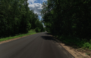 Obraz premium Highway wide road, transport and blue sky on a summer day
