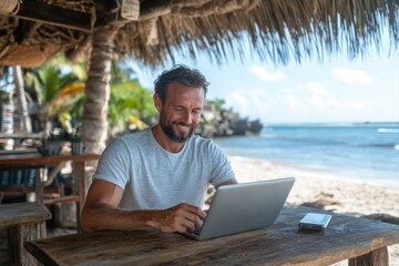 Digital nomad working remotely on laptop at beach cafe enjoying success