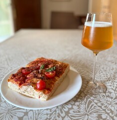 homemade pizza with glass of beer