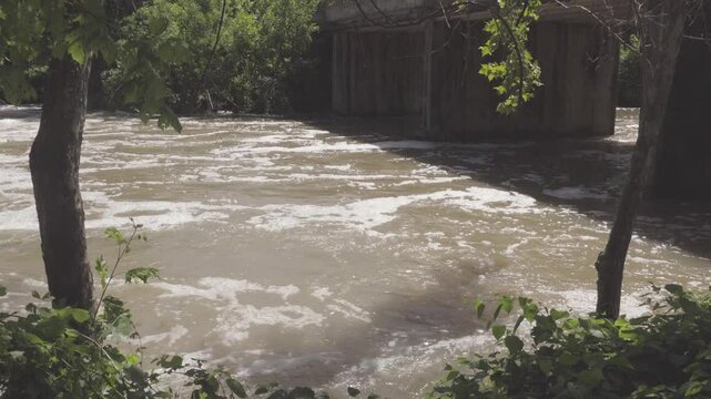 Texas 2025 flood water running under road bridge
