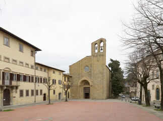 Facade of the medieval Church of San Domenico with Romanesque bell tower and portal, Arezzo,...
