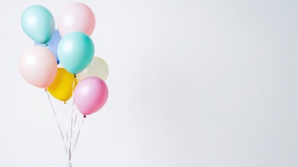 Floating pastel balloons in soft hues of pink, orange, mint, and lilac, set against a smooth neutral white-gray backdrop with a serene ambiance.